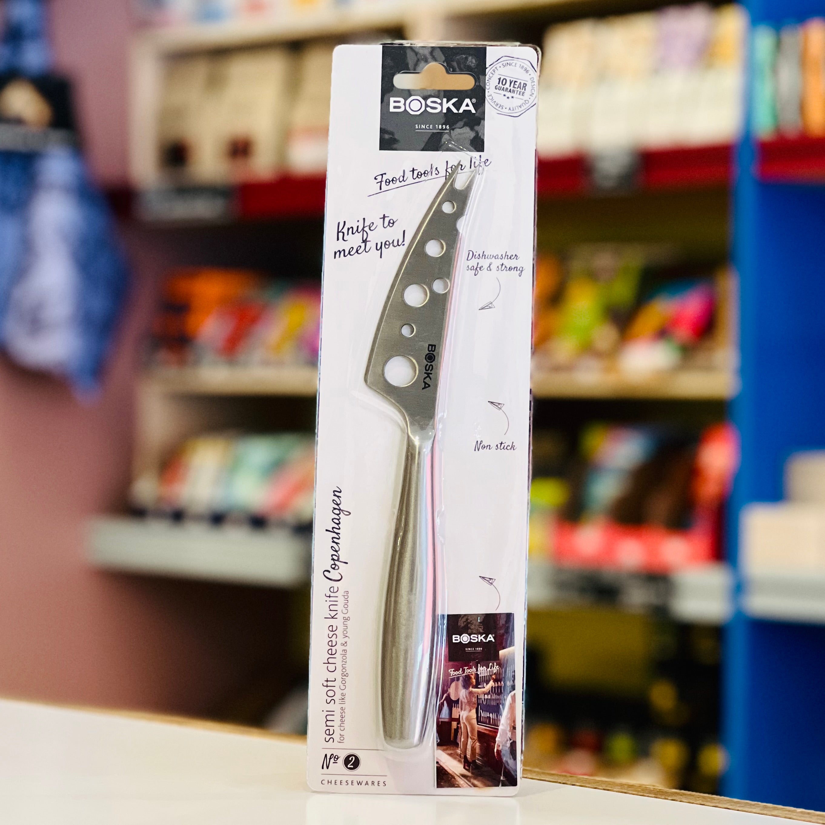 Boska knife packaging with a blurred store shelf in the background