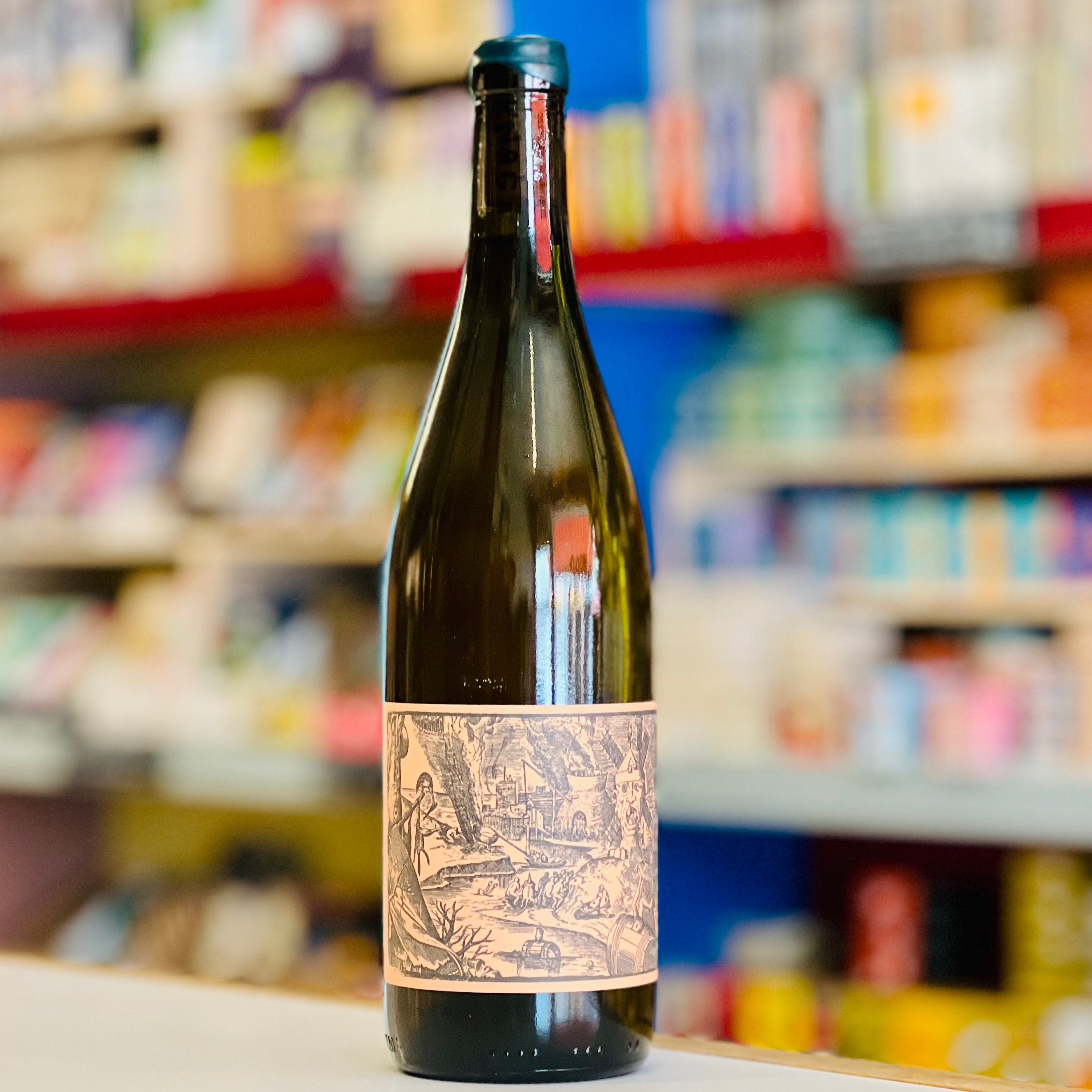 Wine bottle with decorative label on a shelf in a store