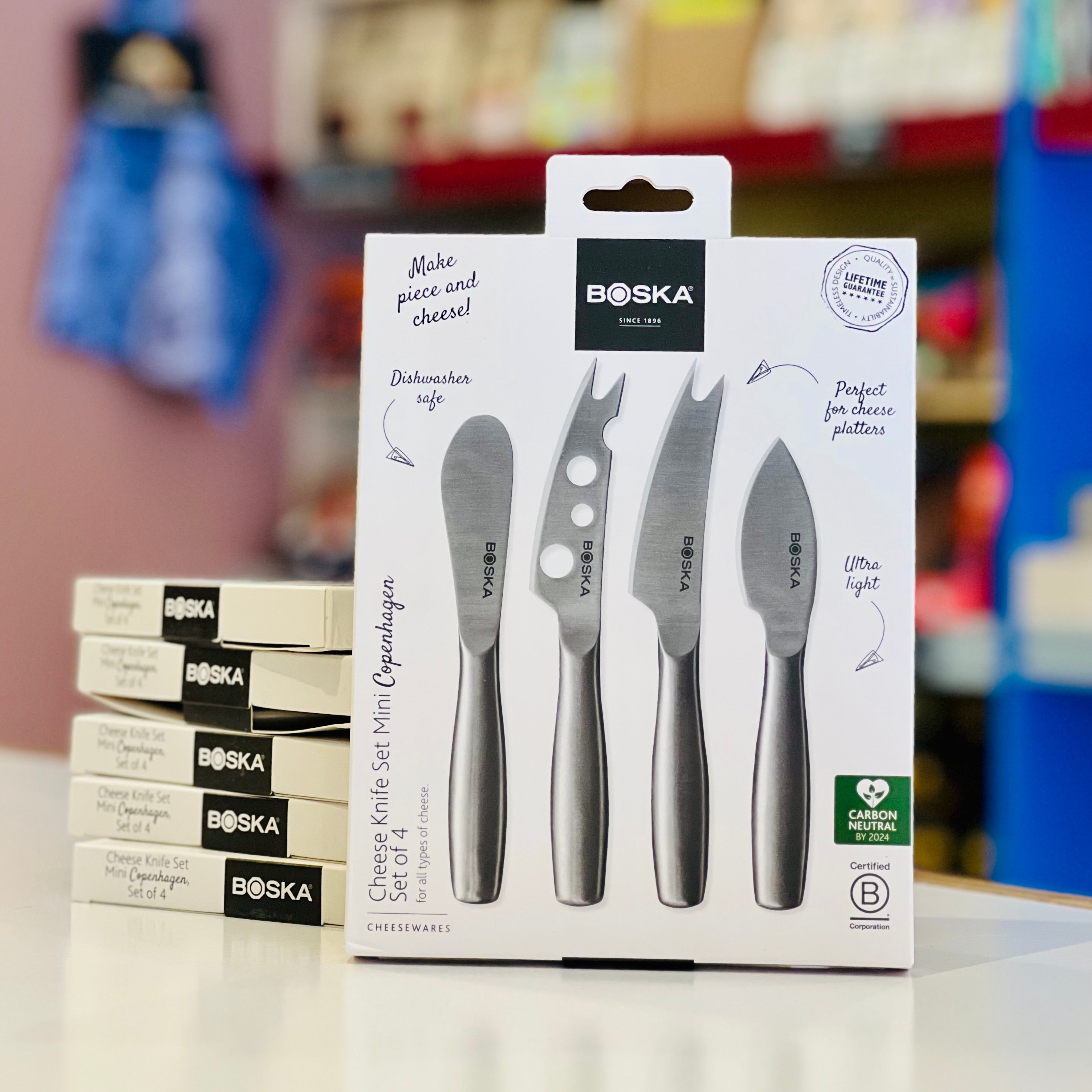Boska cheese knife set packaging with knives displayed in front
