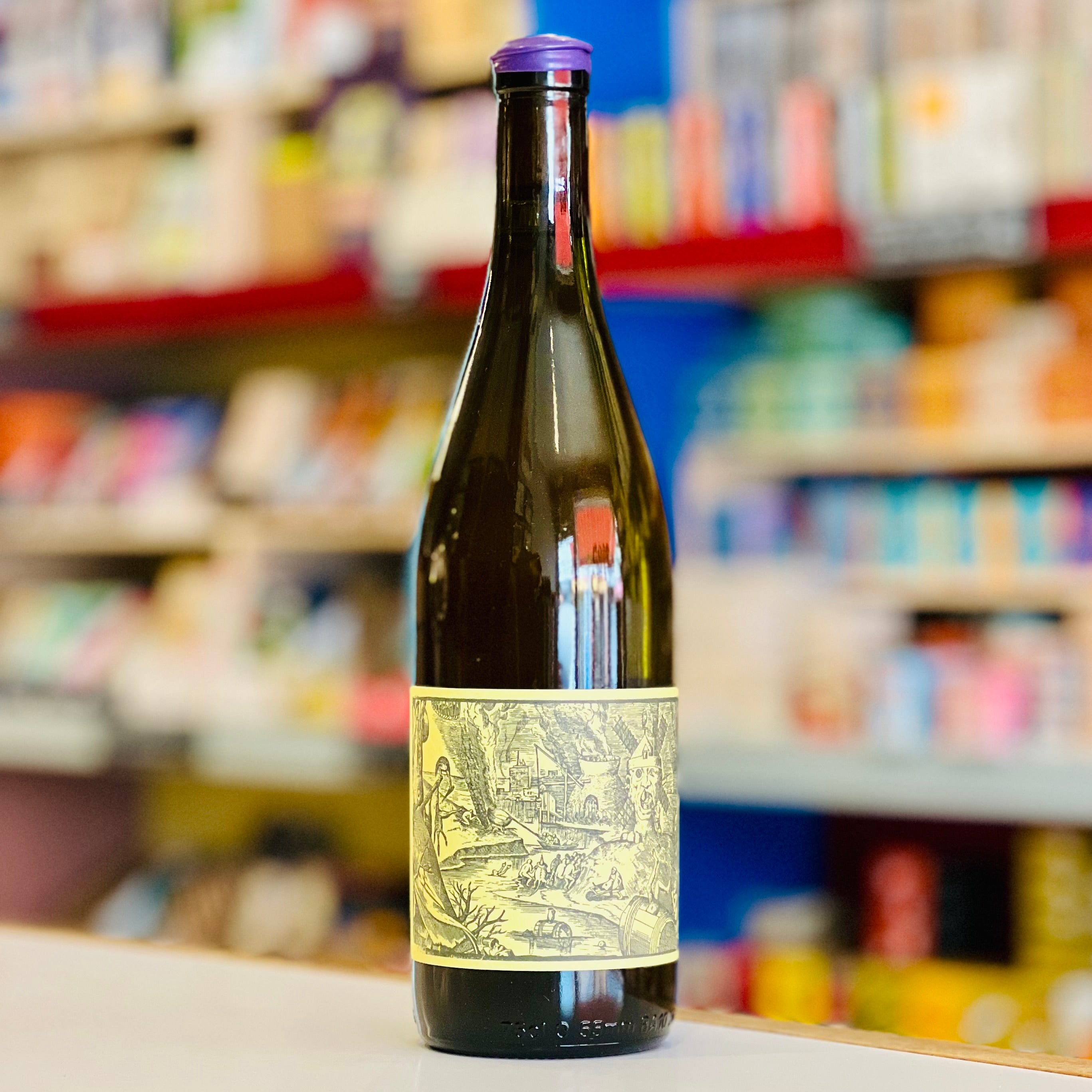 Wine bottle with a decorative label on a shelf in a store
