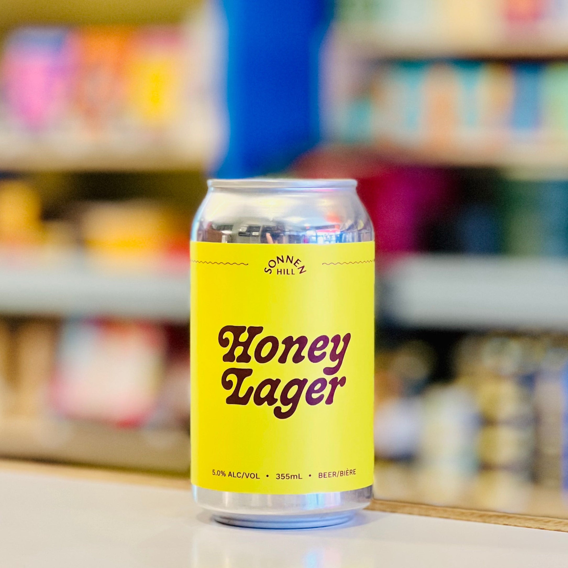 Can of Honey Lager on a shelf in a store
