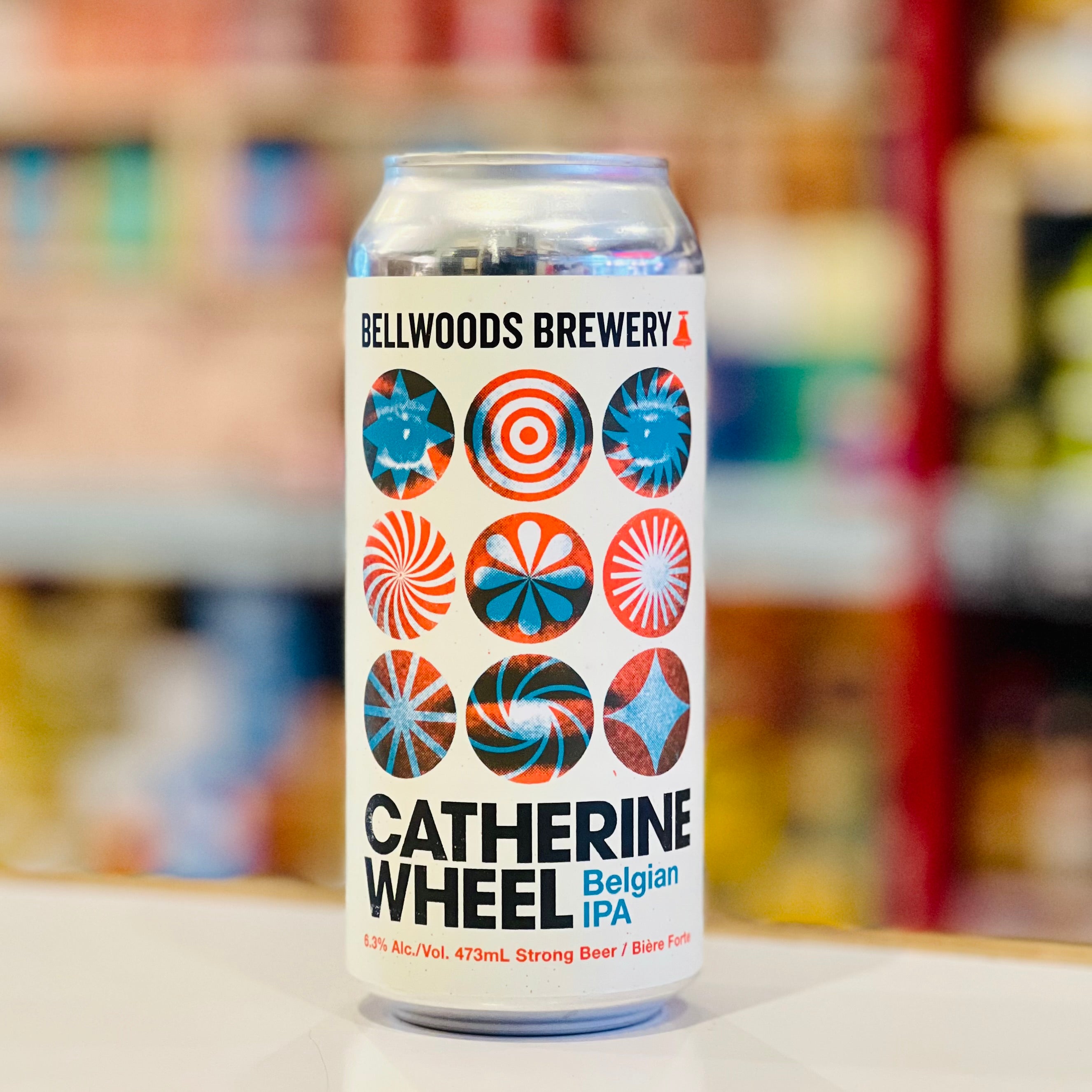 Bellwoods Brewery Catherine Wheel Belgian IPA can on a blurred background