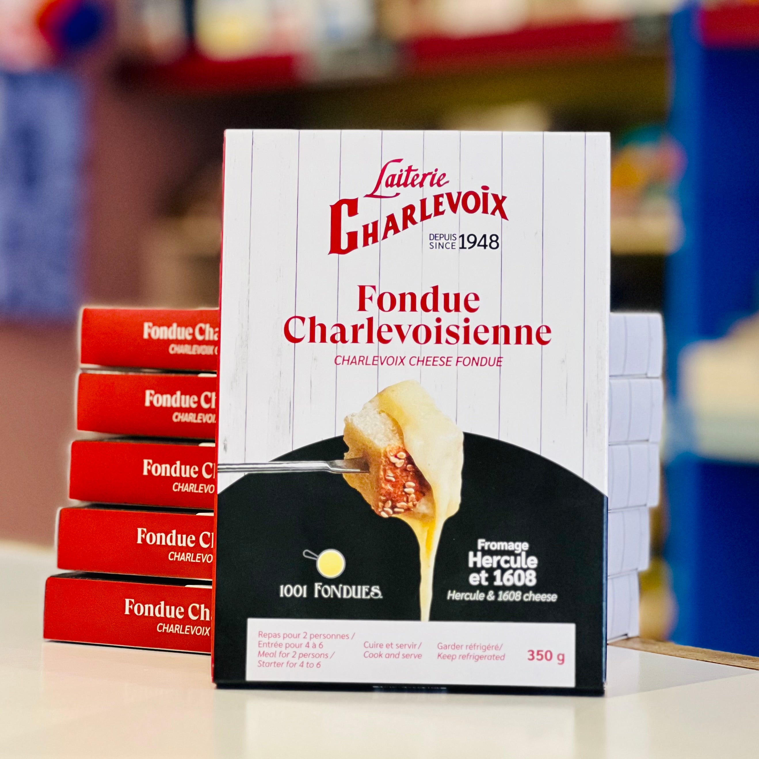 Laiterie Charlevoix cheese fondue packaging with a blurred store background