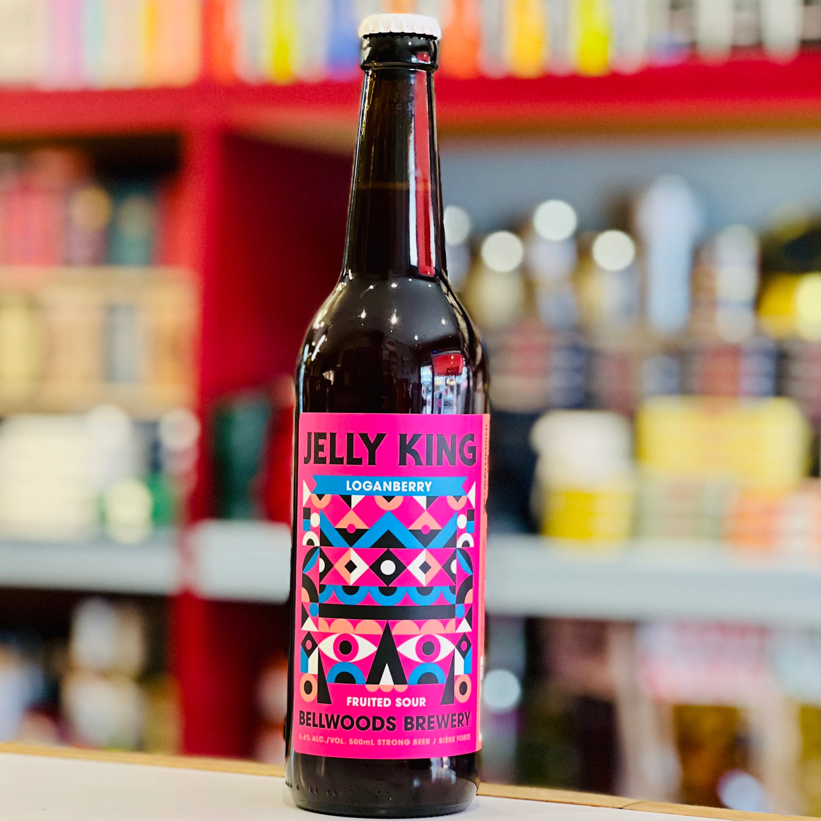 Bottle of Jelly King beer with a colorful label in a store setting