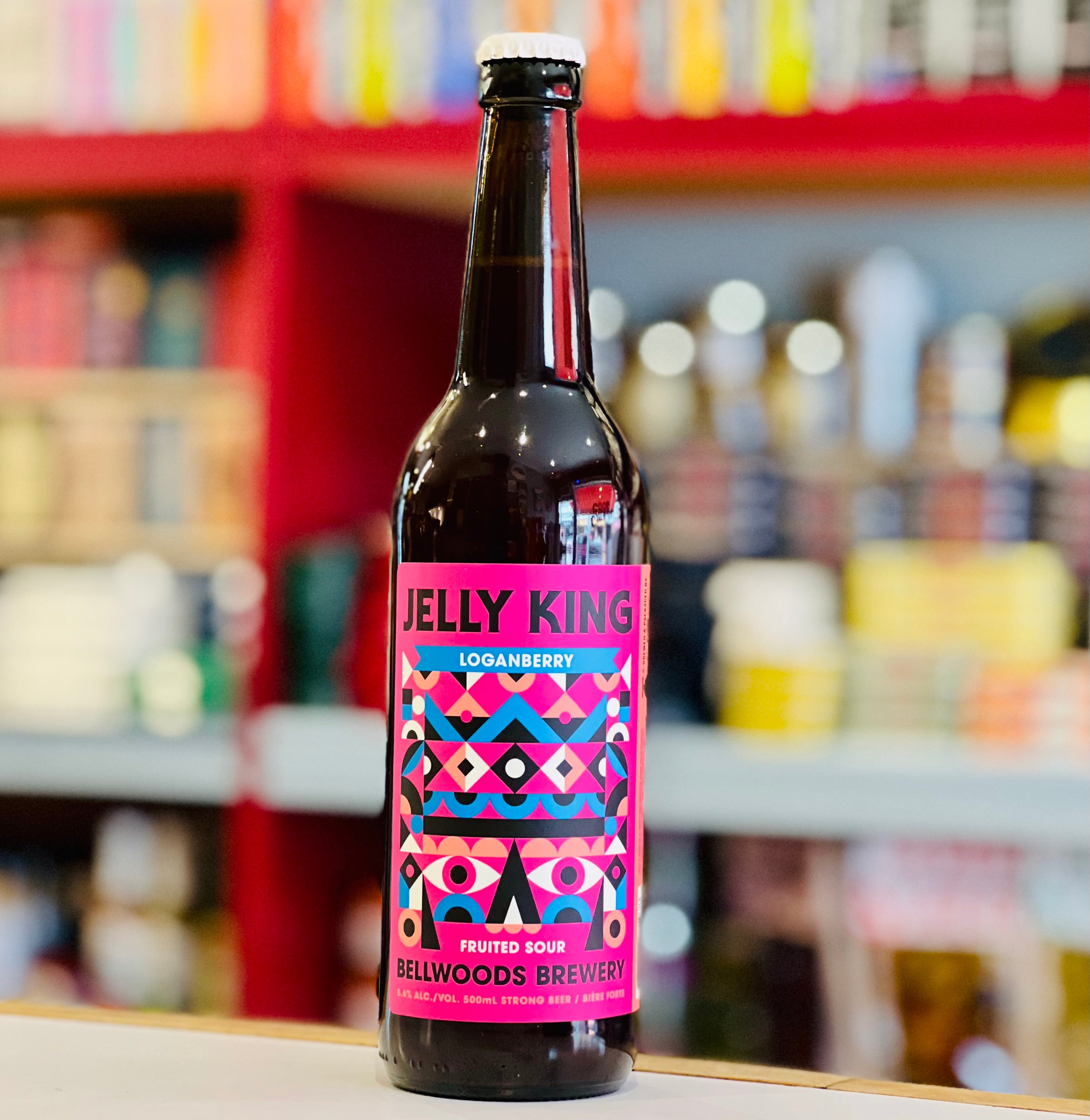 Bottle of Jelly King beer with a colorful label in a store setting
