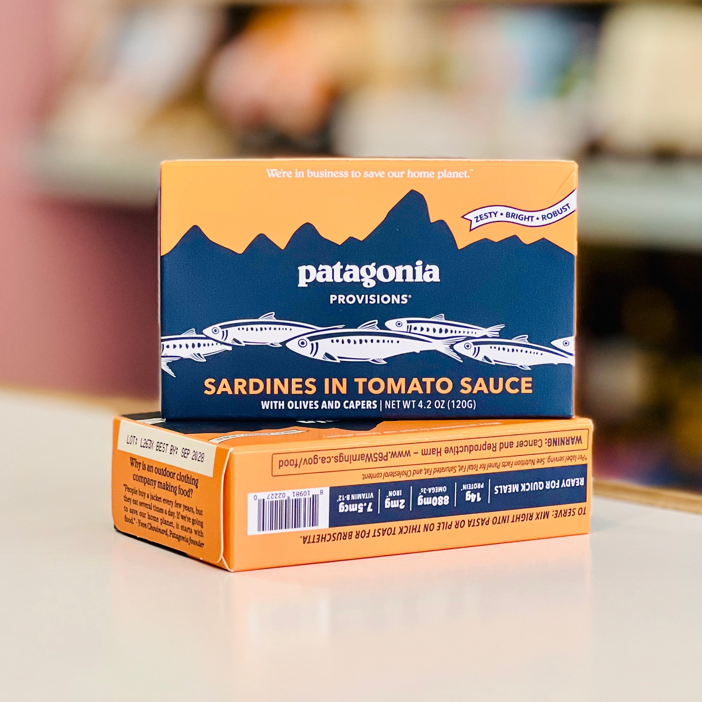 Patagonia Provisions sardines in tomato sauce packaging on a blurred background