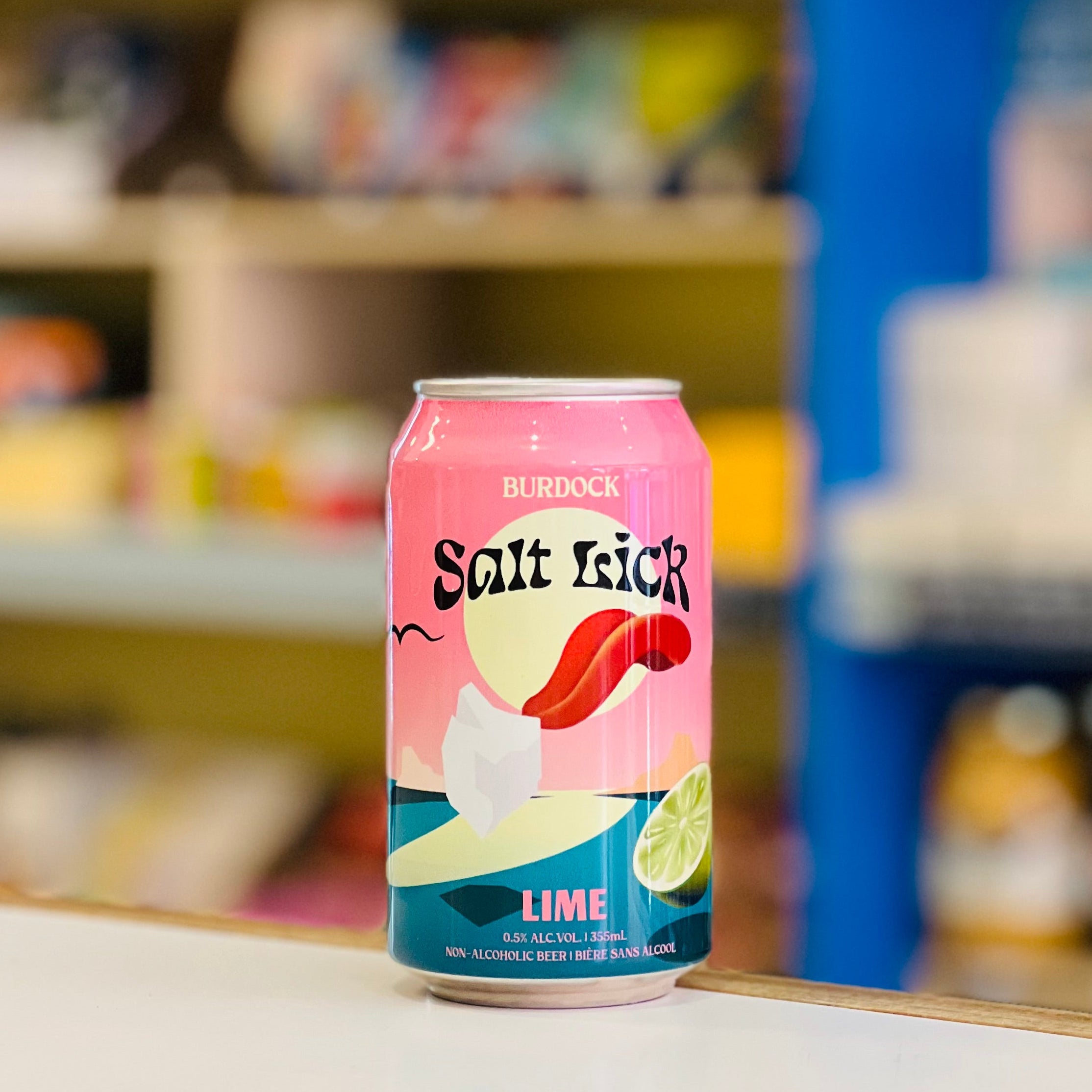 Burdock Salt Lick Lime can on a shelf with blurred store background