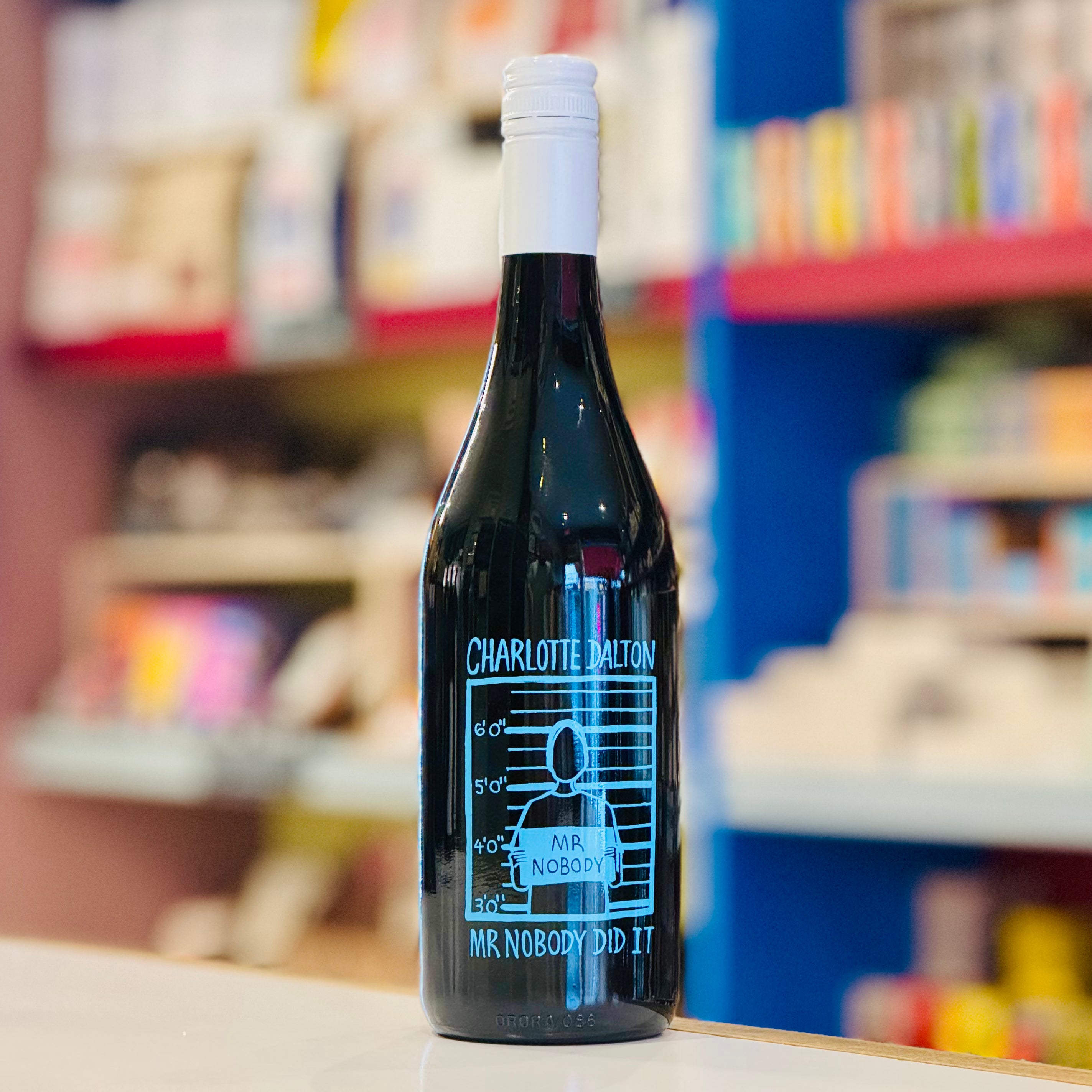 Bottle of wine with a label in a store setting