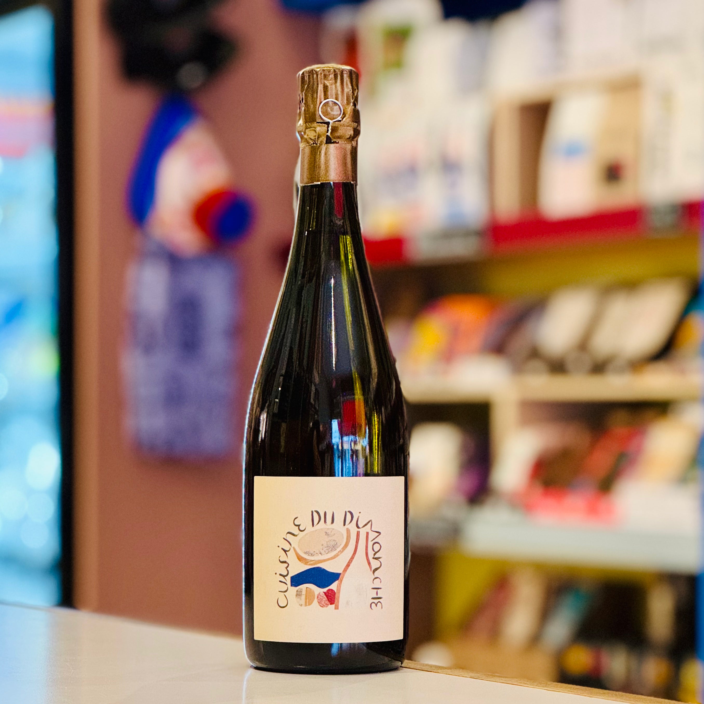 Bottle of wine with a cork on a shelf in a store