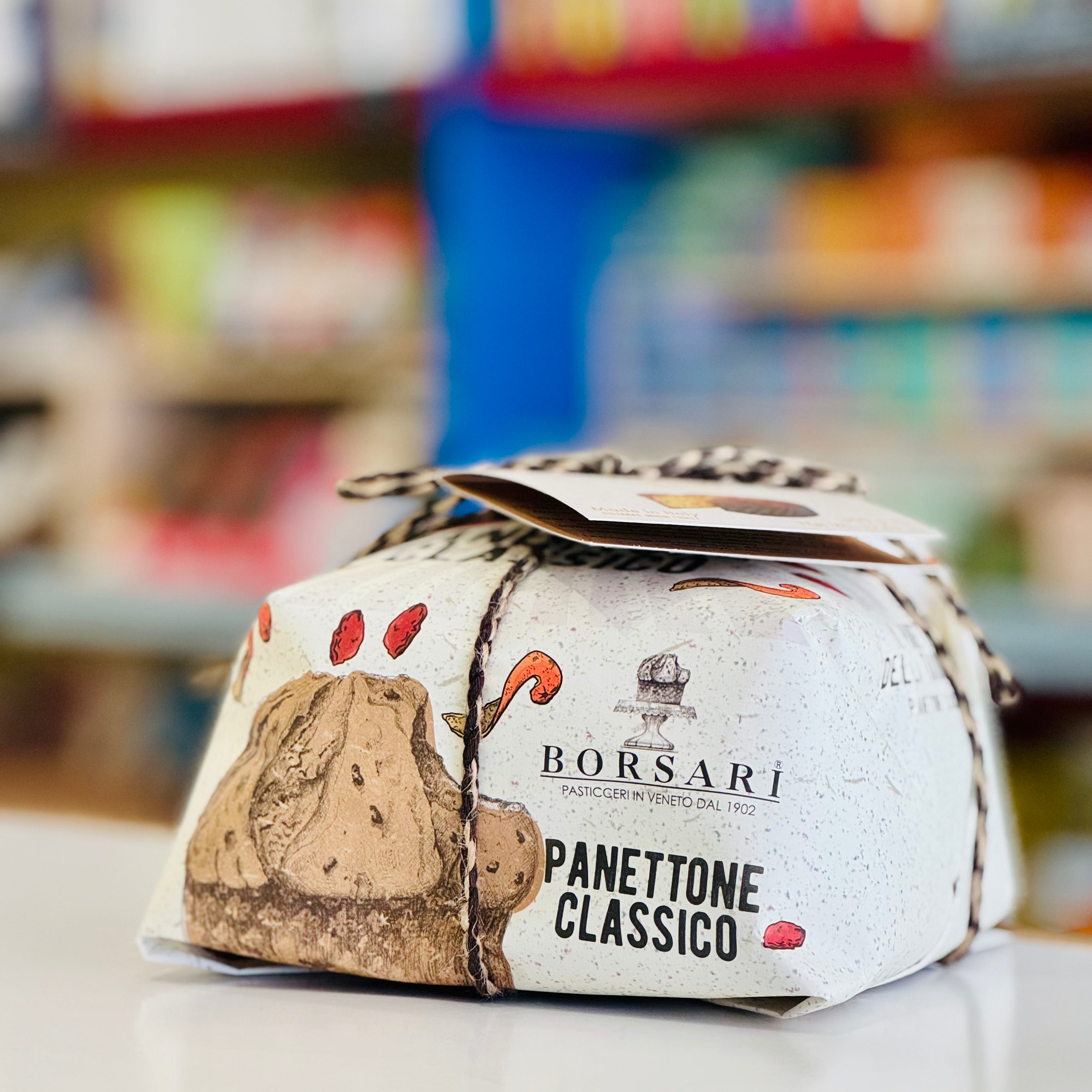 Borsari Panettone Classico packaging with a blurred store background
