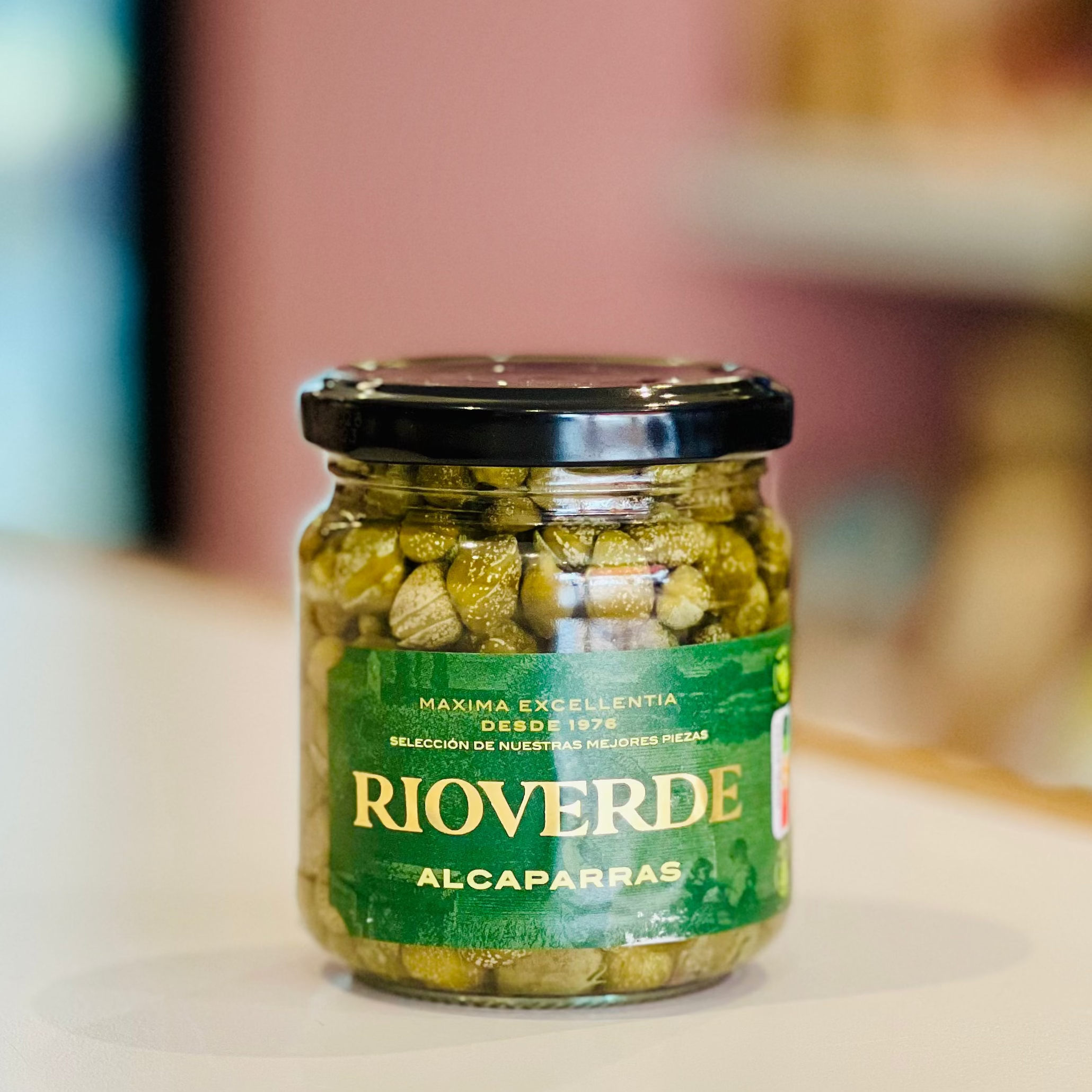 Jar of Rioverde Alcaparras on a blurred background