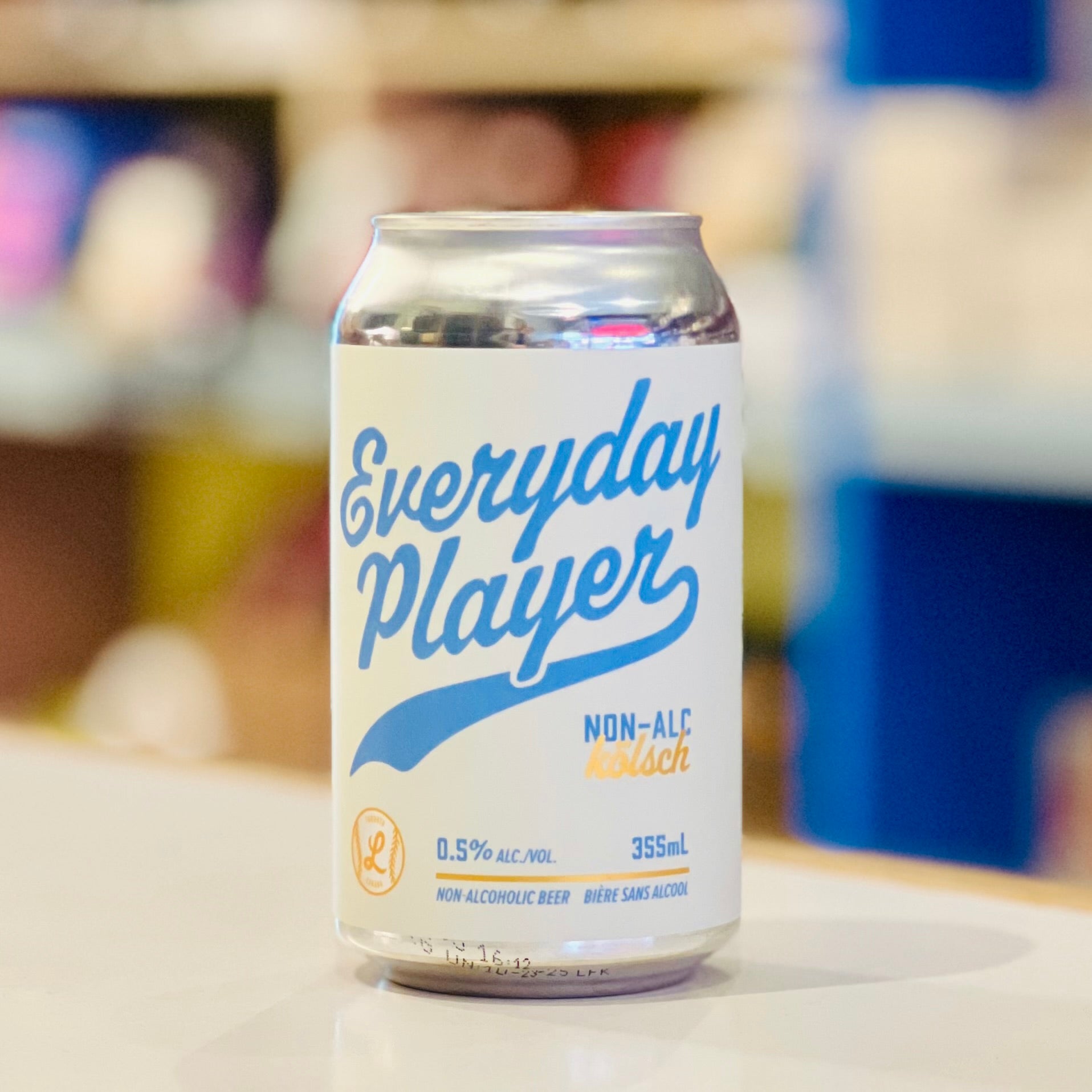 Can of 'Everyday Player' non-alcoholic beer on a blurred background