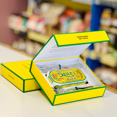 Yellow box with a product inside on a blurred background