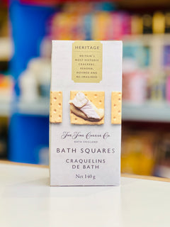 Box of Bath Squares crackers with a blurred store shelf in the background